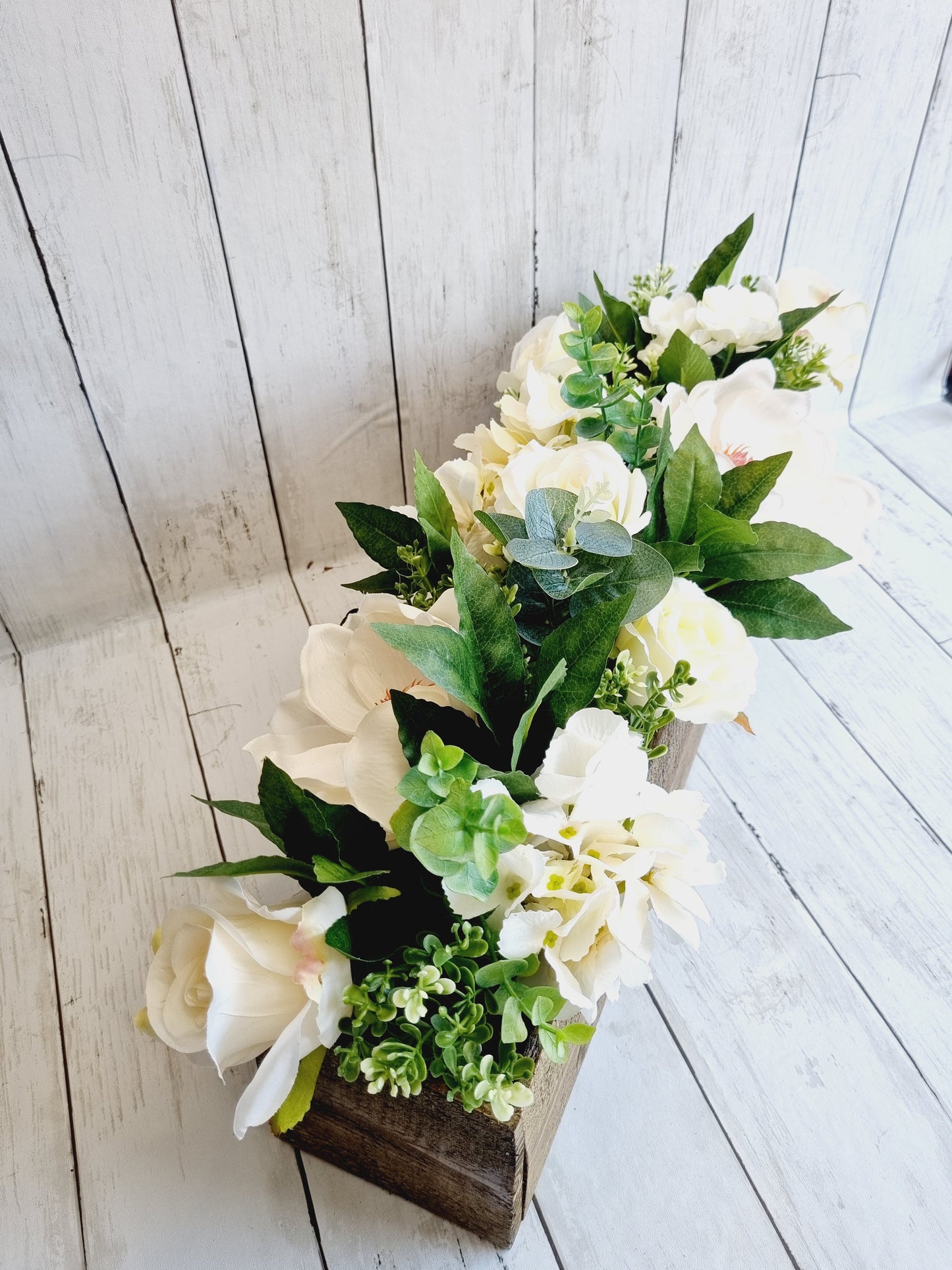 Luxury white magnolia and hydrangea floral arrangement